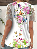 AYSHA - Elegancki top z koronkowym wykończeniem i kwiatowym wzorem motyla